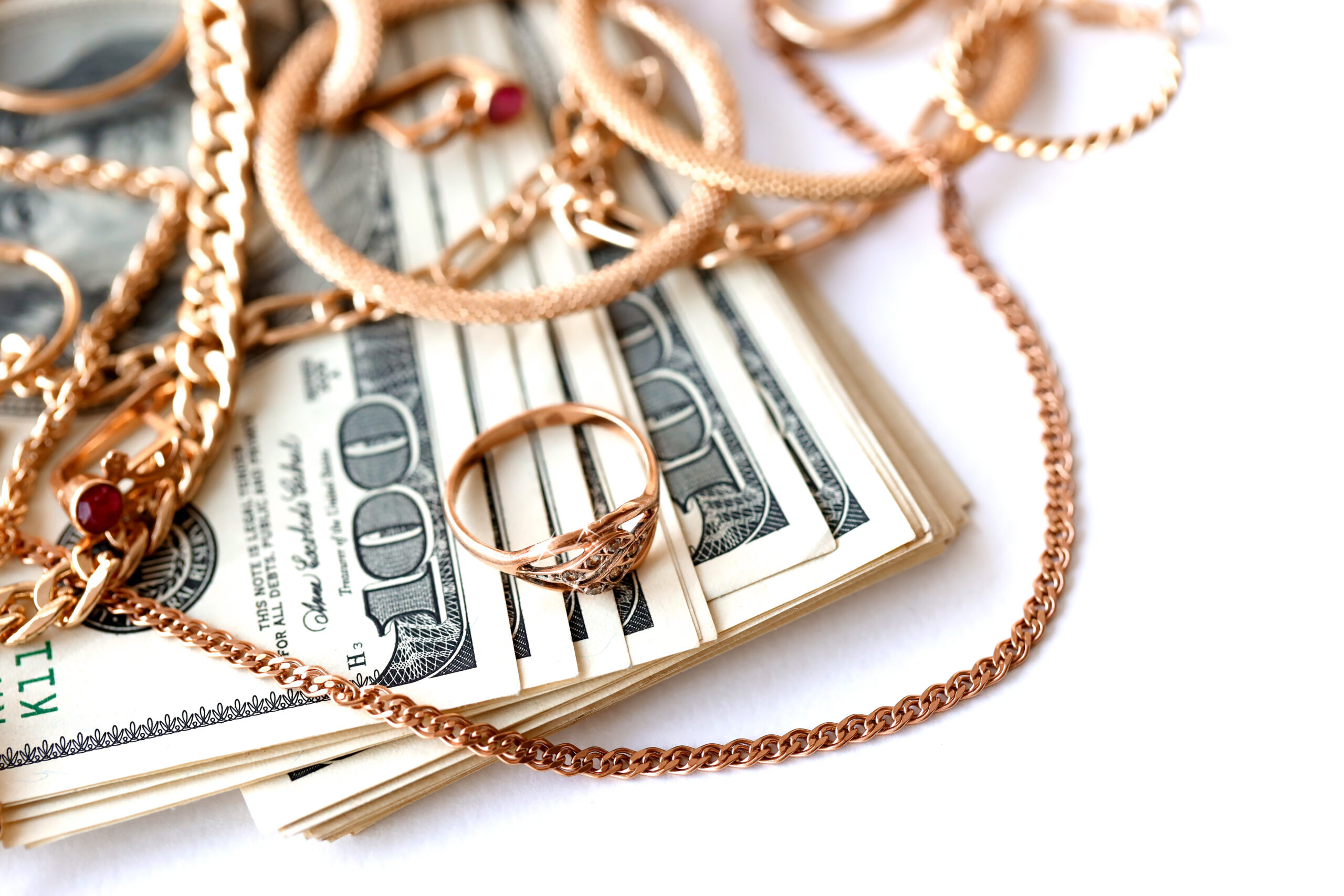 Many expensive golden jewelry rings earrings in los angeles pawn shop